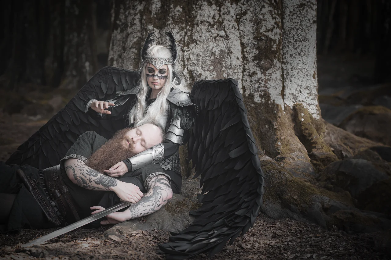winged pair by tree