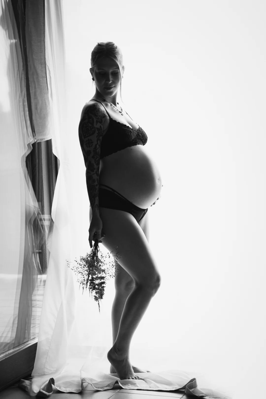 maternity portrait by window